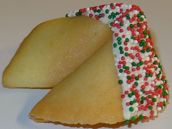 fortune cookie with white chocolate and red and green nonpareils