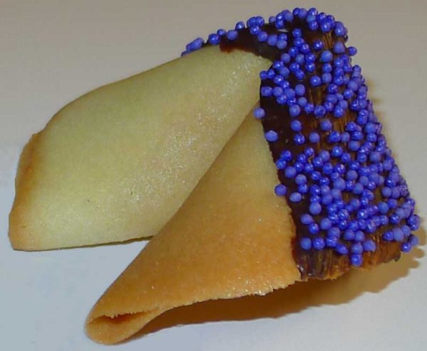 fortune cookie with chocolate and purple sprinkles
